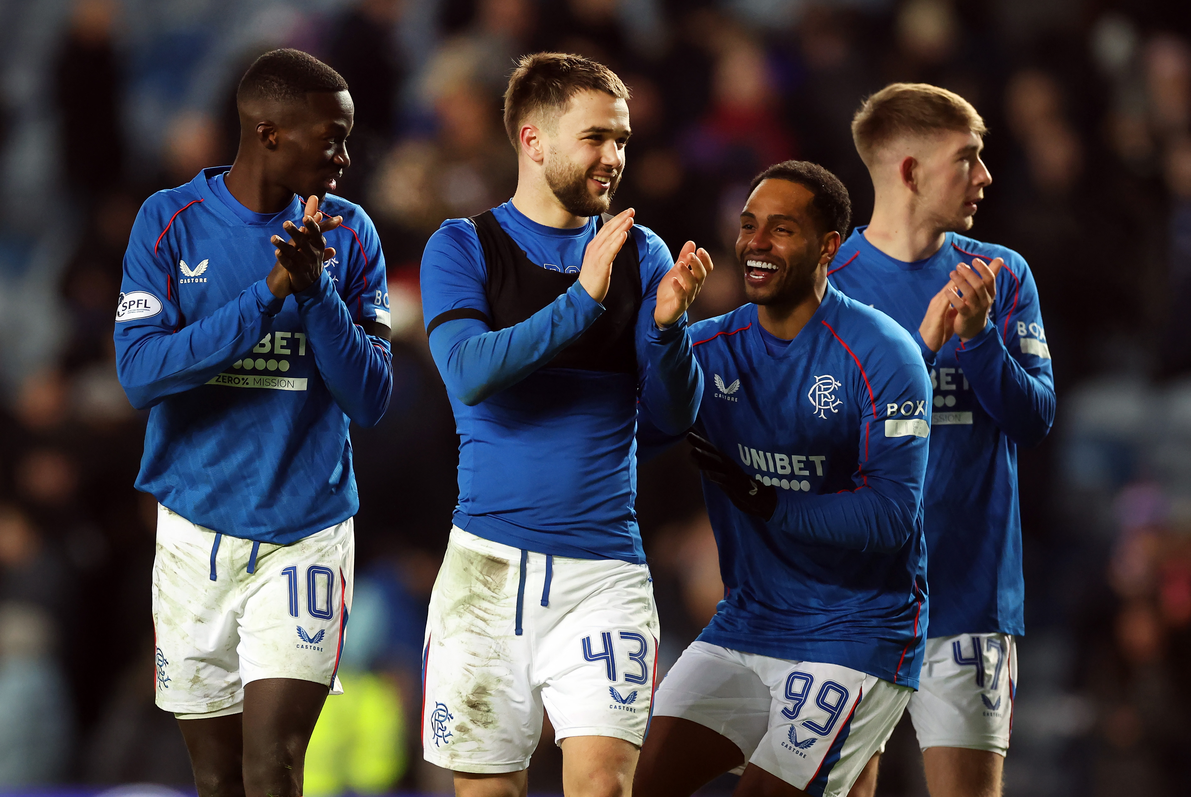Rangers players celebrate against Celtic