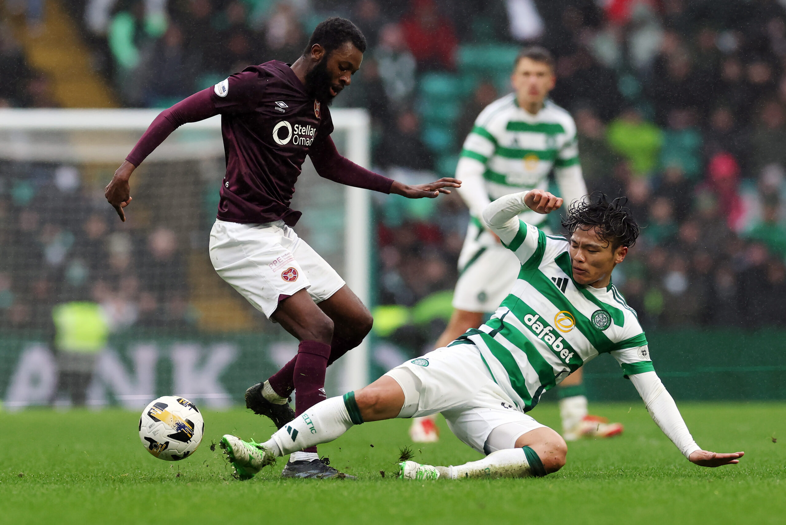 Celtic midfielder Hatate in action against Hearts