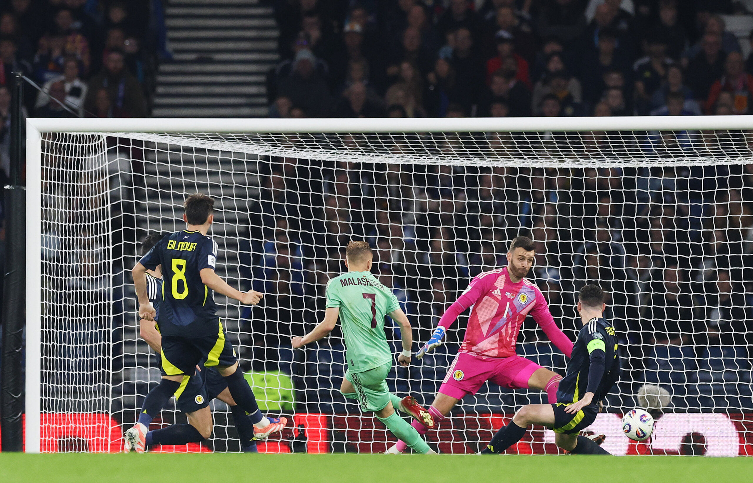 Celtic target Gunn in action for Scotland
