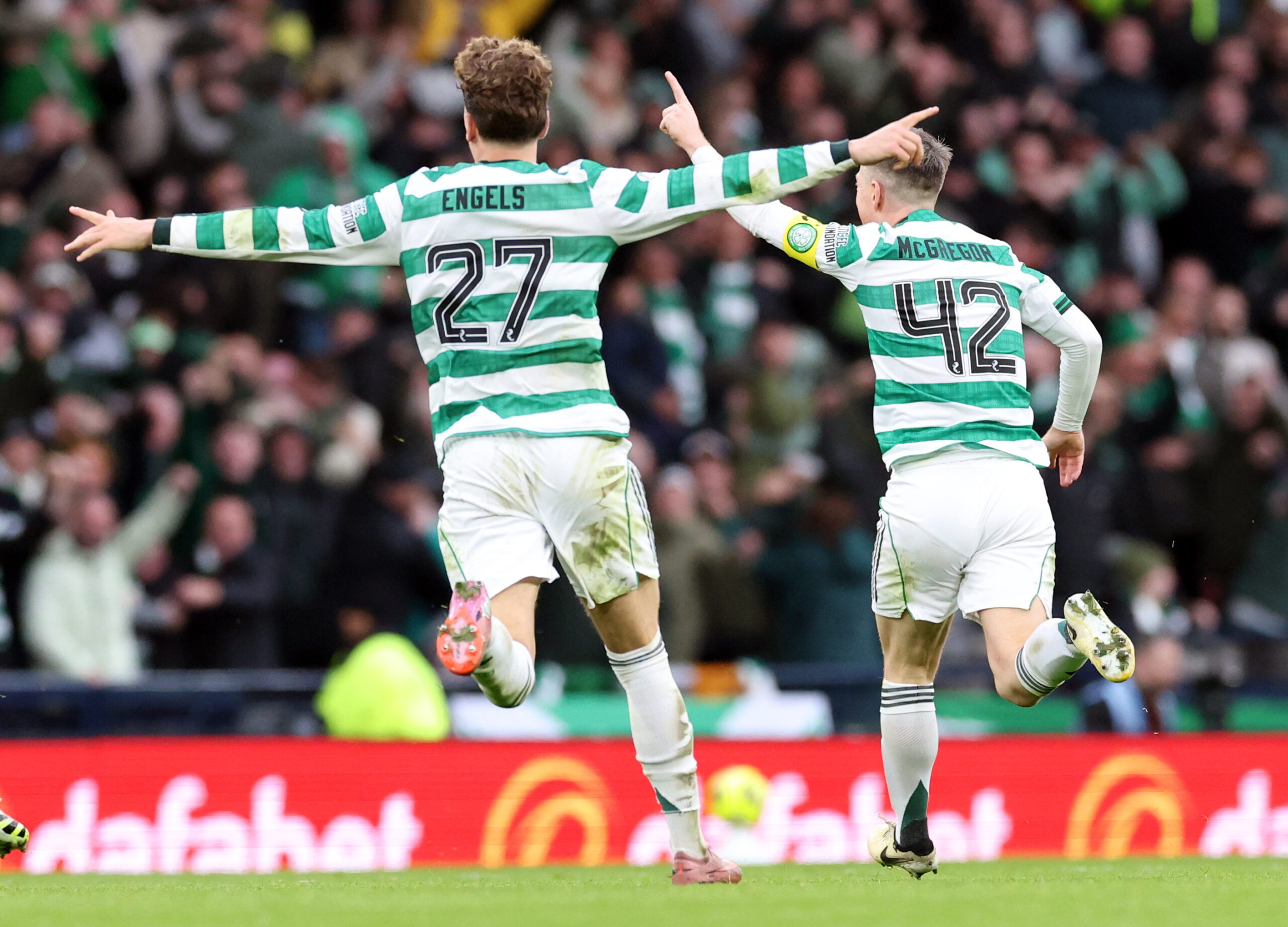Celtic skipper McGregor celebrates his stunning goal against Rangers