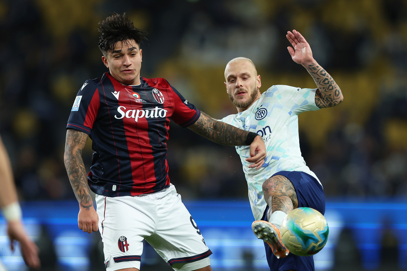 Bologna striker Santiago Castro in action on the pitch, a transfer target for Aston Villa and Chelsea.