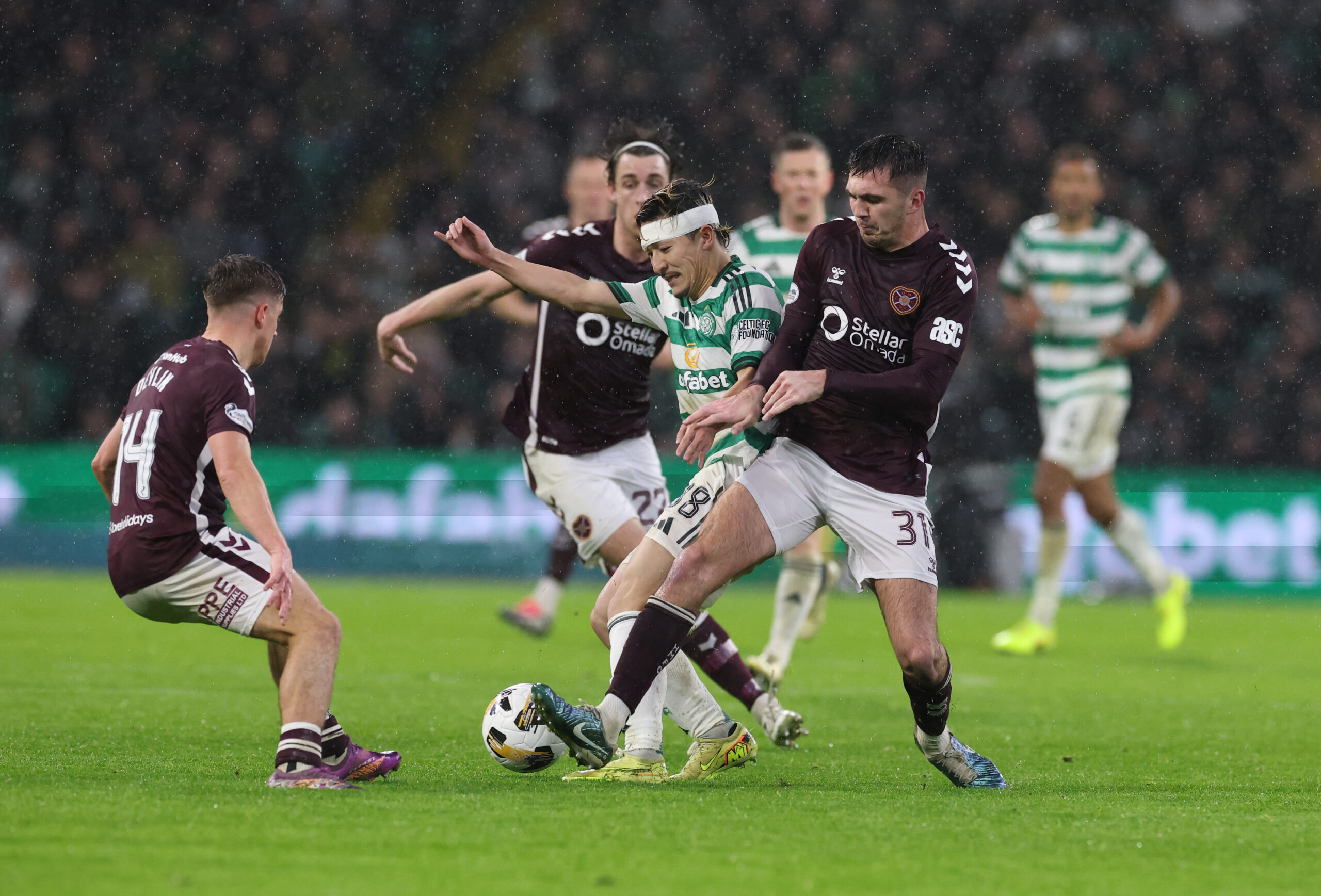 Celtic forward Maeda in action against Hearts
