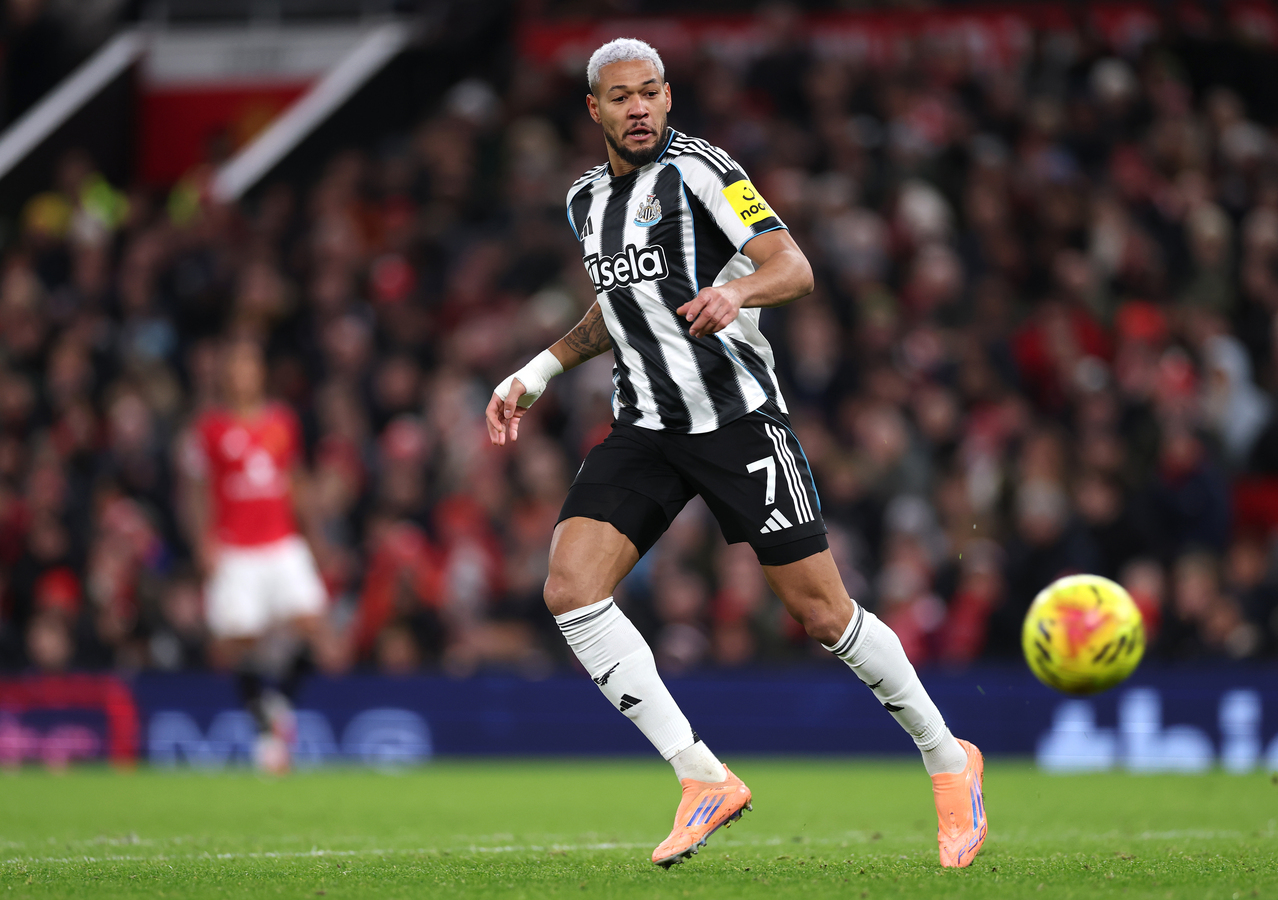 Newcastle United midfielder Joelinton in action at St James' Park wearing the black and white home kit.