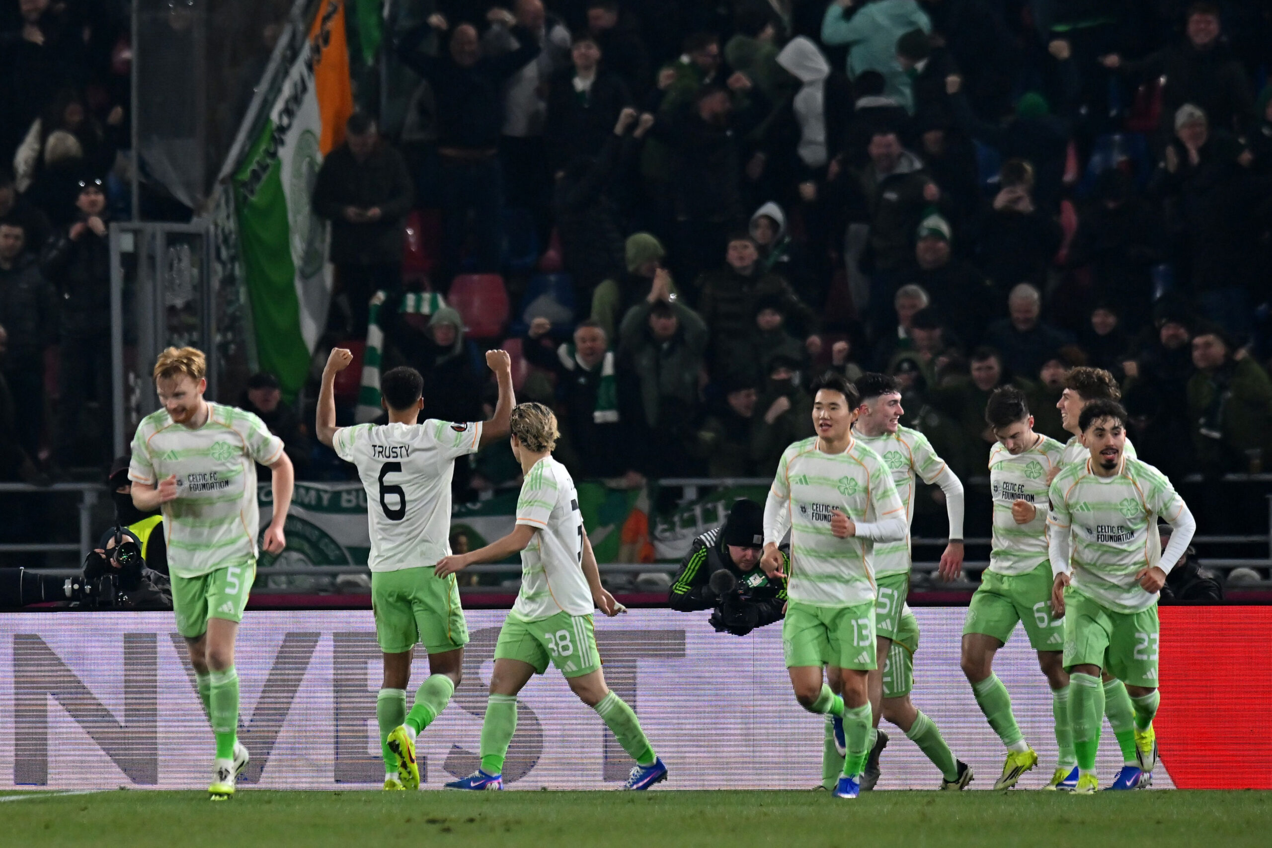 Celtic defender Trusty celebrates his goal against Bologna