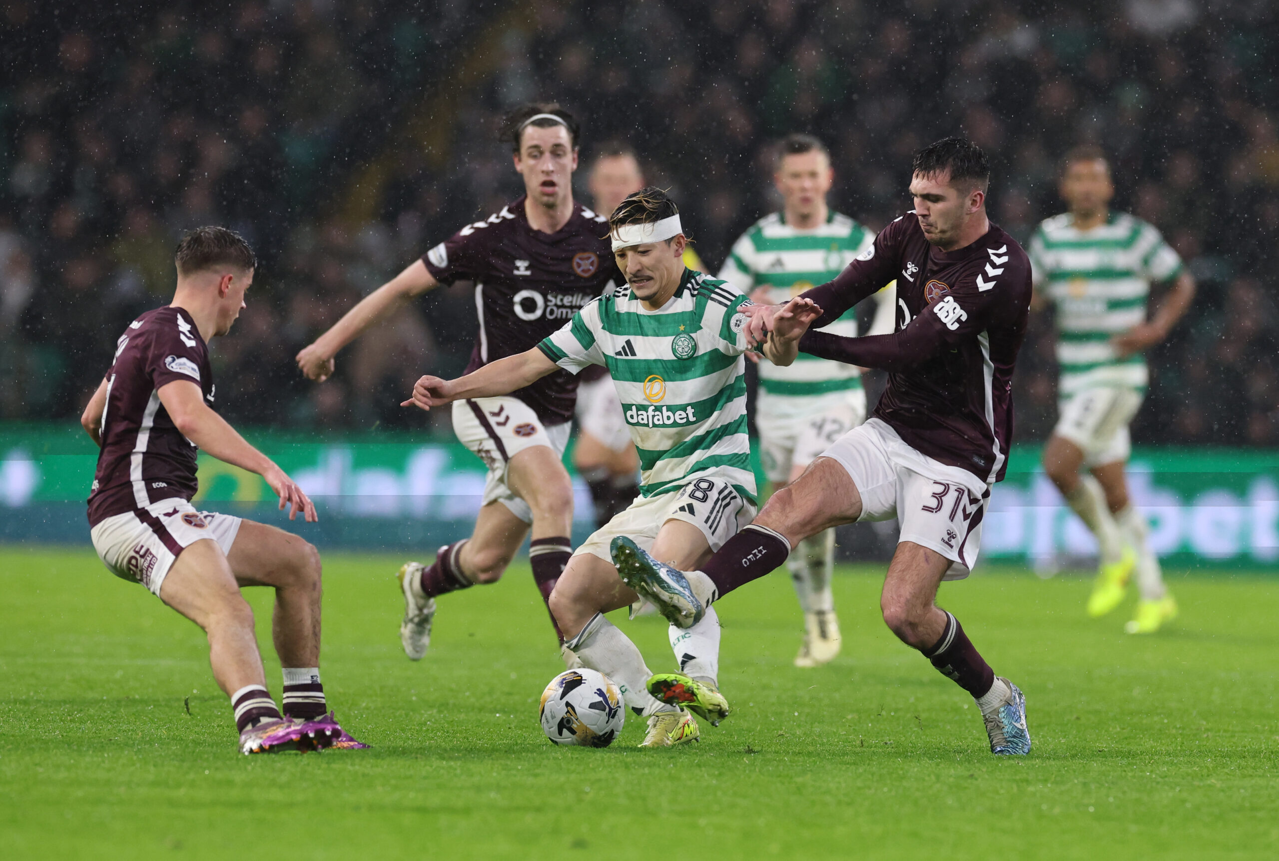 Celtic attacker Maeda in action against Hearts