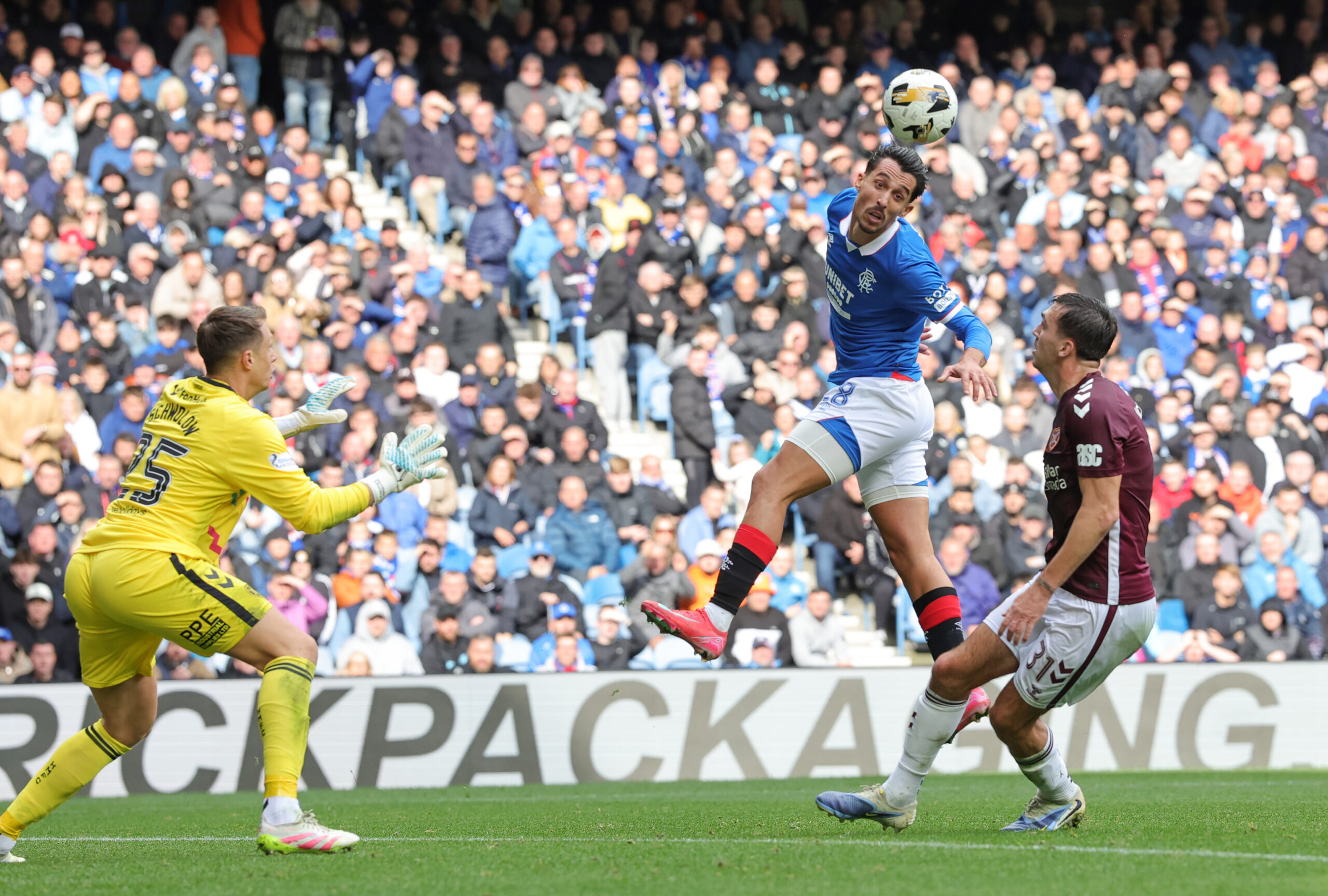 Rangers forward Miovski in action against Hearts