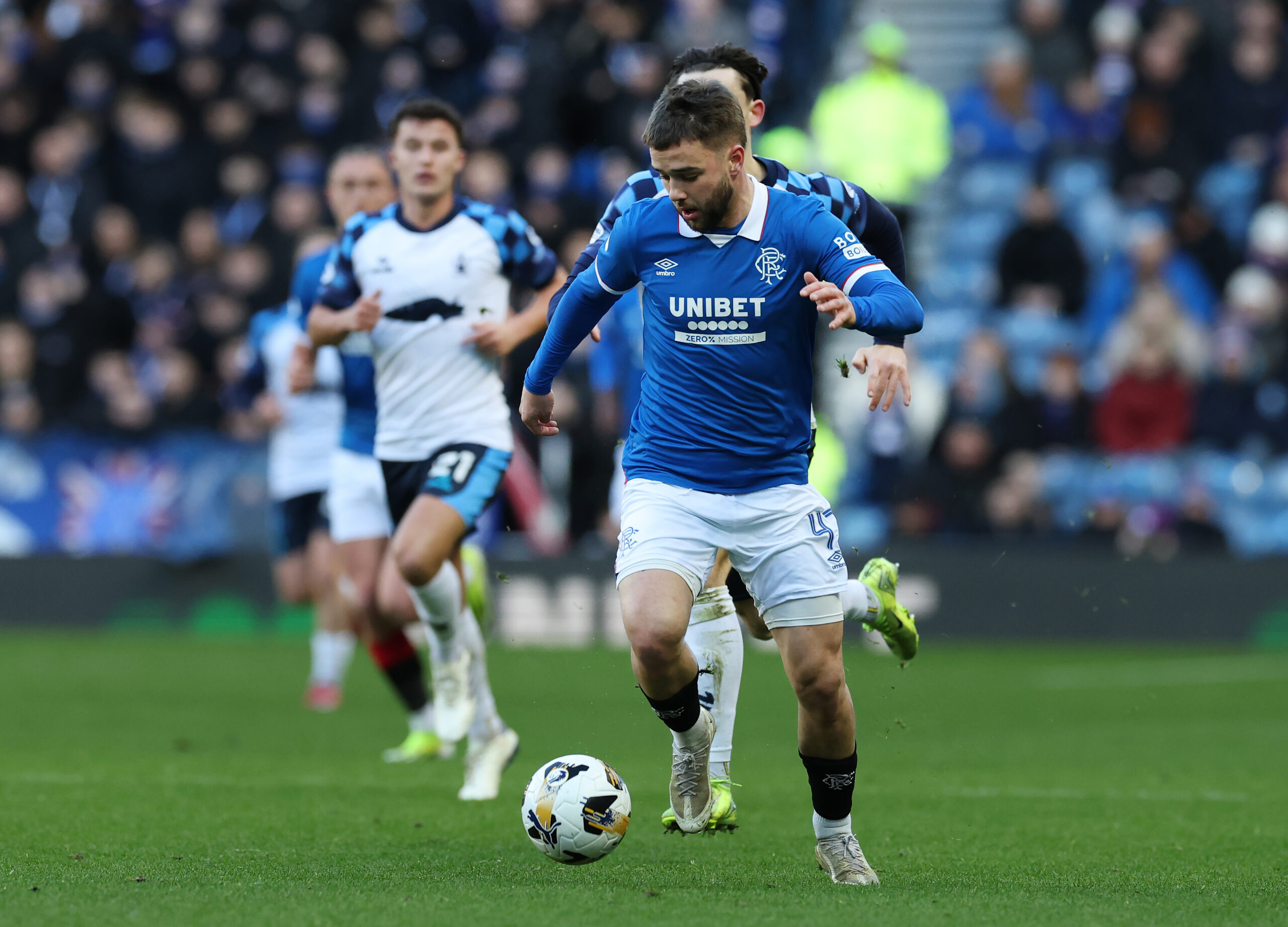 Rangers midfielder Raskin in action against Falkirk