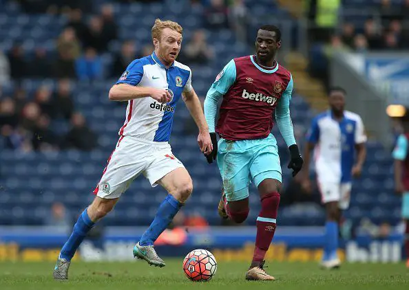 BLACKBURN, ENGLAND - FEBRUARY 21:  Chris Taylor of Blackburn Rovers is pursued by Pedro Mba Obiang of West Ham United during The Emirates FA Cup fifth round match between Blackburn Rovers and West Ham United at Ewood park on February 21, 2016 in Blackburn, England.  (Photo by Jan Kruger/Getty Images)