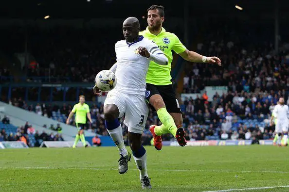 LEEDS, ENGLAND - OCTOBER 17: Tomer Hemed of Brighton & Hove Albion FC jumps on the back of Souleman Bamba (c) of Leeds United FC during the Sky Bet Championship match between Leeds United and Brighton & Hove Albion at Elland Road on October 17, 2015 in Leeds, England.  (Photo by Daniel Smith/Getty Images)