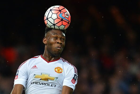 Manchester United's Dutch defender Timothy Fosu-Mensah heads the ball during the FA cup quarter final replay football match between West Ham United and Manchester United at the Boleyn ground in London on April 13, 2016.  / AFP / GLYN KIRK        (Photo credit should read GLYN KIRK/AFP/Getty Images)