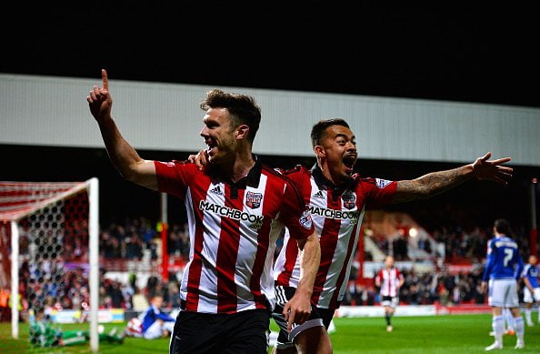 BRENTFORD, ENGLAND - APRIL 19:  Scott Hogan of Brentford FC celebrates scoring the 1st  goal during the Sky Bet Championship match between Brentford and Cardiff City on April 19, 2016 in Brentford, United Kingdom.  (Photo by Justin Setterfield/Getty Images)
