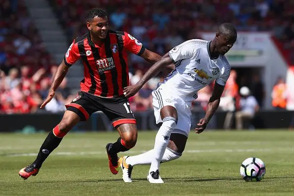 BOURNEMOUTH, ENGLAND - AUGUST 14: Eric Bailly (R) of Manchester United is tracked by Joshua King (L) of Bournemouth during the Premier League match between AFC Bournemouth and Manchester United at the Vitality Stadium on August 14, 2016 in Bournemouth, England.  (Photo by Michael Steele/Getty Images)