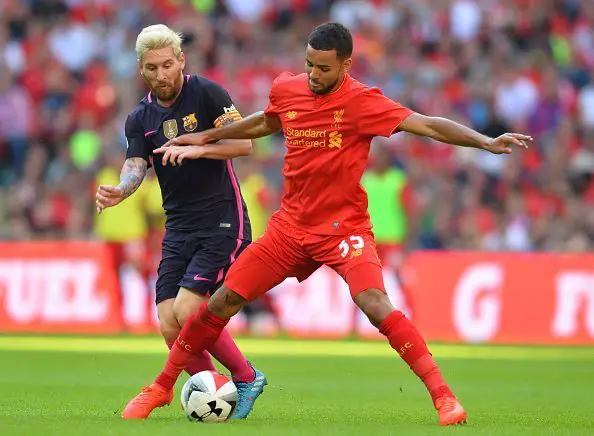 Liverpool's English defender Kevin Stewart (R) vies with Barcelona's Argentinian striker Lionel Messi during the pre-season International Champions Cup football match between Spanish champions, Barcelona and Liverpool at Wembley stadium in London on August 6, 2016. / AFP / Glyn KIRK        (Photo credit should read GLYN KIRK/AFP/Getty Images)