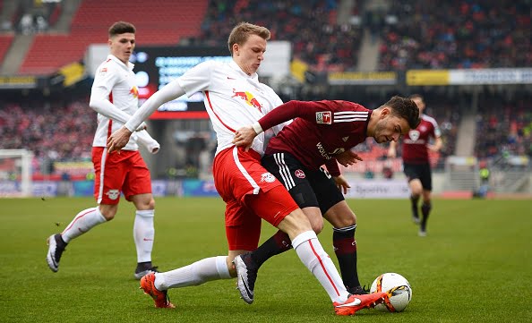 NUREMBERG, GERMANY - MARCH 20: Lukas Klostermann (L) of Leipzig and Tim Leibold of Nuernberg compete for the ball during the Second Bundesliga match between 1. FC Nuernberg and RB Leipzig at Grundig-Stadion on March 20, 2016 in Nuremberg, Germany.  (Photo by Micha Will/Bongarts/Getty Images)
