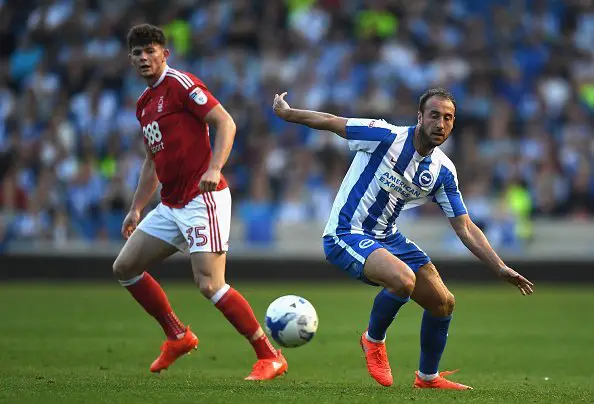 BRIGHTON, ENGLAND - AUGUST 12:  Glenn Murray of Brighton and Hove Albion in action as Oliver Burke of Nottingham Forest looks on during the Sky Bet Championship match between Brighton & Hove Albion and Nottingham Forest at Amex Stadium on August 12, 2016 in Brighton, England.  (Photo by Mike Hewitt/Getty Images)