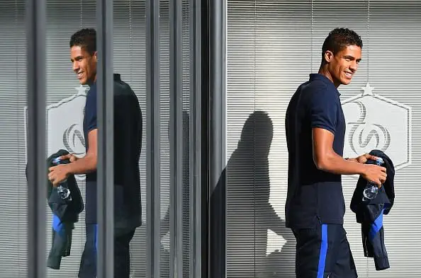 France's defender Raphael Varane leaves from a press conference in Clairefontaine-en-Yvelines on August 29, 2016, as part of the team's preparation for the upcoming friendly football match against Italy.  / AFP / FRANCK FIFE        (Photo credit should read FRANCK FIFE/AFP/Getty Images)