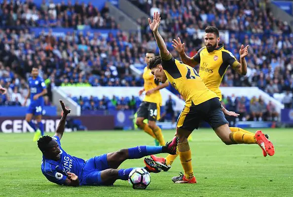 LEICESTER, ENGLAND - AUGUST 20: Ahmed Musa of Leicester City is challenged by Hector Bellerin of Arsenal during the Premier League match between Leicester City and Arsenal at The King Power Stadium on August 20, 2016 in Leicester, England.  (Photo by Michael Regan/Getty Images)