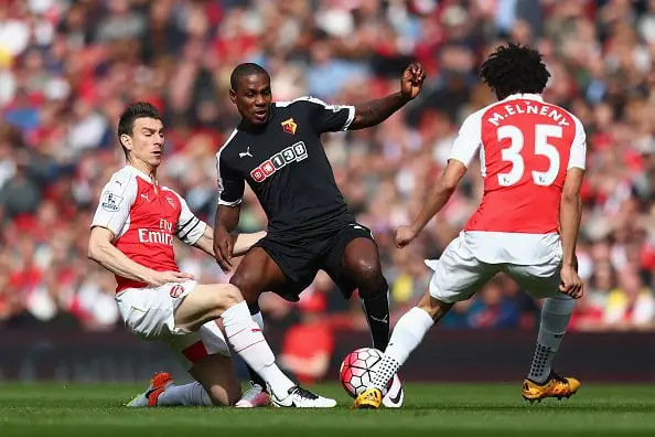 LONDON, ENGLAND - APRIL 02:  Odion Ighalo of Watford battles with Laurent Koscielny of Arsenal and Mohamed Elneny of Arsenal during the Barclays Premier League match between Arsenal and Watford at the Emirates Stadium on April 2, 2016 in London, England.  (Photo by Julian Finney/Getty Images)