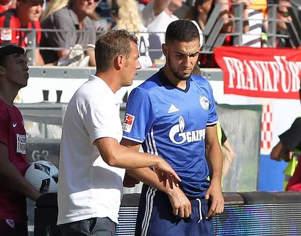 Schalke's head coach Markus Weinzierl talks to Schalke's Algerian midfielder Nabil Bentaleb during the German first division Bundesliga football match of Eintracht Frankfurt vs FC Schalke 04 in Frankfurt am Main, western Germany, on August 27, 2016.  / AFP / DANIEL ROLAND / RESTRICTIONS: DURING MATCH TIME: DFL RULES TO LIMIT THE ONLINE USAGE TO 15 PICTURES PER MATCH AND FORBID IMAGE SEQUENCES TO SIMULATE VIDEO. == RESTRICTED TO EDITORIAL USE == FOR FURTHER QUERIES PLEASE CONTACT DFL DIRECTLY AT + 49 69 650050
        (Photo credit should read DANIEL ROLAND/AFP/Getty Images)