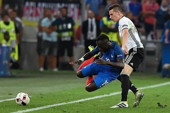 France's defender Bacary Sagna (L) vies for the ball against Germany's midfielder Julian Draxler during the Euro 2016 semi-final football match between Germany and France at the Stade Velodrome in Marseille on July 7, 2016.
 / AFP / FRANCK FIFE        (Photo credit should read FRANCK FIFE/AFP/Getty Images)