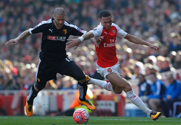 Watford's French midfielder Adlene Guedioura (L) vies with Arsenal's English defender Kieran Gibbs during the English FA Cup quarter final football match between Arsenal and Watford at the Emirates Stadium in London on March 13, 2016. 
Watford won the game 2-1. / AFP / Ian Kington / RESTRICTED TO EDITORIAL USE. No use with unauthorized audio, video, data, fixture lists, club/league logos or 'live' services. Online in-match use limited to 75 images, no video emulation. No use in betting, games or single club/league/player publications.  /         (Photo credit should read IAN KINGTON/AFP/Getty Images)