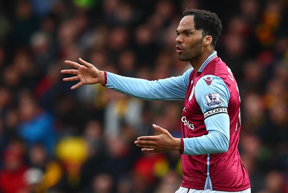 WATFORD, ENGLAND - APRIL 30:  Joleon Lescott of Aston Villa reacts during the Barclays Premier League match between Watford and Aston Villa at Vicarage Road on April 30, 2016 in Watford, England.  (Photo by Clive Rose/Getty Images)