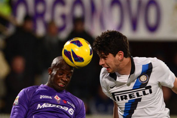 Inter Milan's defender Andrea Ranocchia (R) fights for the ball with Fiorentina's midfielder Mohamed Sissoko of Mali during the Italian Serie A football match between Fiorentina and Inter Milan at the Artemio Franchi Stadium in Florence on February 17, 2013. AFP PHOTO / GIUSEPPE CACACE        (Photo credit should read GIUSEPPE CACACE/AFP/Getty Images)
