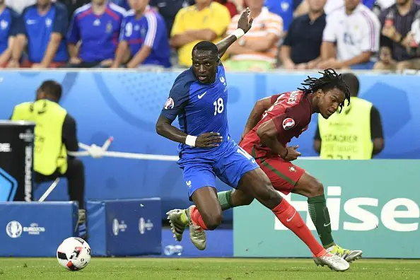 France's midfielder Moussa Sissoko (L) vies for the ball against Portugal's midfielder Renato Sanches during the Euro 2016 final football match between France and Portugal at the Stade de France in Saint-Denis, north of Paris, on July 10, 2016. / AFP / MARTIN BUREAU        (Photo credit should read MARTIN BUREAU/AFP/Getty Images)