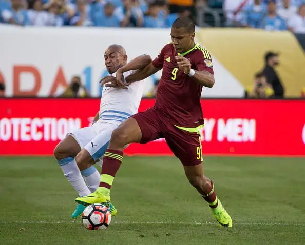 PHILADELPHIA, PA - JUNE 09: Salomon Rondon #9 of Venezuela controls the ball against Egidio Arevalo Rios #17 of Uruguay during the 2016 Copa America Centenario Group C match at Lincoln Financial Field on June 9, 2016 in Philadelphia, Pennsylvania. Venezuela defeated Uruguay 1-0. (Photo by Mitchell Leff/Getty Images)