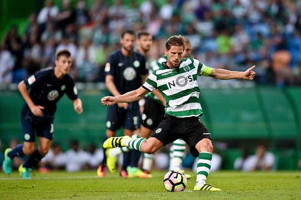 Sporting's midfielder Adrien Silva kicks a penalty to score against VFL Wolfsburg during the Violinos Cup football match between Sporting CP and VFL Wolfsburg at Alvalade stadium in Lisbon on July 30, 2016.  / AFP / PATRICIA DE MELO MOREIRA        (Photo credit should read PATRICIA DE MELO MOREIRA/AFP/Getty Images)