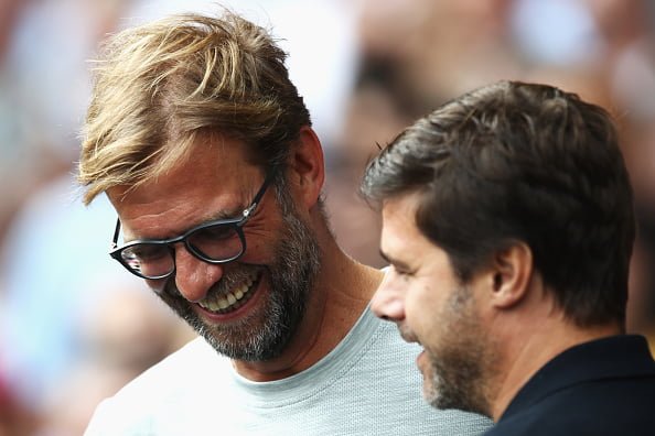 LONDON, ENGLAND - AUGUST 27: Jurgen Klopp, Manager of Liverpool (L) shares a smile with Mauricio Pochettino, Manager of Tottenham Hotspur (R) during the Premier League match between Tottenham Hotspur and Liverpool at White Hart Lane on August 27, 2016 in London, England.  (Photo by Julian Finney/Getty Images)