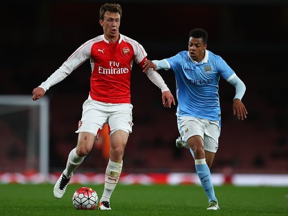 LONDON, ENGLAND - APRIL 04:  Krystian Bielik of Arsenal battles with Lukas Nmecha of Man City during the FA Youth Cup semi-final second leg match between Arsenal and Manchester City at Emirates Stadium on April 4, 2016 in London, England.  (Photo by Julian Finney/Getty Images)