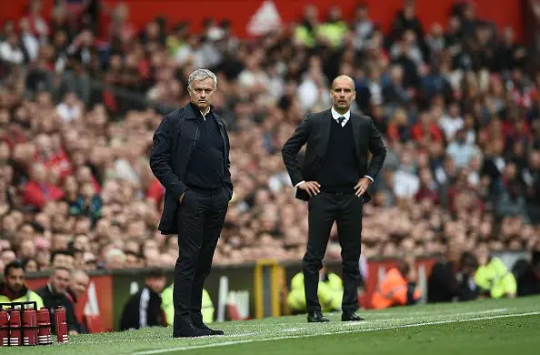 Manchester United's Portuguese manager Jose Mourinho (L) and Manchester City's Spanish manager Pep Guardiola (R) watch from the touchline during the English Premier League football match between Manchester United and Manchester City at Old Trafford in Manchester, north west England, on September 10, 2016. / AFP / Oli SCARFF / RESTRICTED TO EDITORIAL USE. No use with unauthorized audio, video, data, fixture lists, club/league logos or 'live' services. Online in-match use limited to 75 images, no video emulation. No use in betting, games or single club/league/player publications.  /         (Photo credit should read OLI SCARFF/AFP/Getty Images)