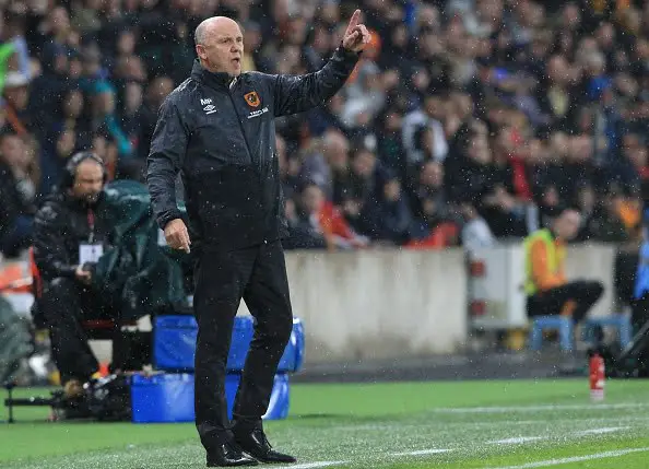 Hull City's caretaker manager Mike Phelan gestures from the touchline during the English Premier League football match between Hull City and Manchester United at the KCOM Stadium in Kingston upon Hull, north east England on August 27, 2016.
Manchester united won the game 1-0. / AFP / Lindsey PARNABY / RESTRICTED TO EDITORIAL USE. No use with unauthorized audio, video, data, fixture lists, club/league logos or 'live' services. Online in-match use limited to 75 images, no video emulation. No use in betting, games or single club/league/player publications.  /         (Photo credit should read LINDSEY PARNABY/AFP/Getty Images)