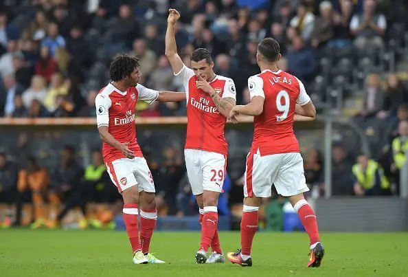 HULL, ENGLAND - SEPTEMBER 17: Granit Xhaka of Arsenal celebrates scoring his sides first goal with team mates  during the Premier League match between Hull City and Arsenal at KCOM Stadium on September 17, 2016 in Hull, England.  (Photo by Tony Marshall/Getty Images)