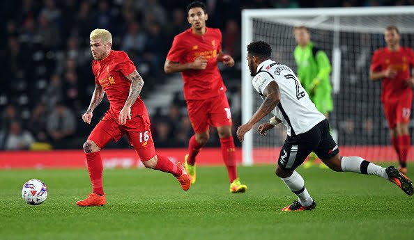 Liverpool's Spanish defender Alberto Moreno (L) runs after the ball in front of Derby's English-born Irish defender Cyrus Christie (R) during the English League Cup third-round football match between Derby County and Liverpool at iPro Stadium in Derby, central England on September 20, 2016. / AFP / PAUL ELLIS / RESTRICTED TO EDITORIAL USE. No use with unauthorized audio, video, data, fixture lists, club/league logos or 'live' services. Online in-match use limited to 75 images, no video emulation. No use in betting, games or single club/league/player publications.  /         (Photo credit should read PAUL ELLIS/AFP/Getty Images)