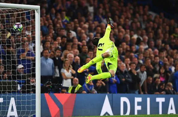 LONDON, ENGLAND - SEPTEMBER 16:  Thibaut Courtois of Chelsea dives in vain as Jordan Henderson of Liverpool scores their second goal during the Premier League match between Chelsea and Liverpool at Stamford Bridge on September 16, 2016 in London, England.  (Photo by Shaun Botterill/Getty Images)