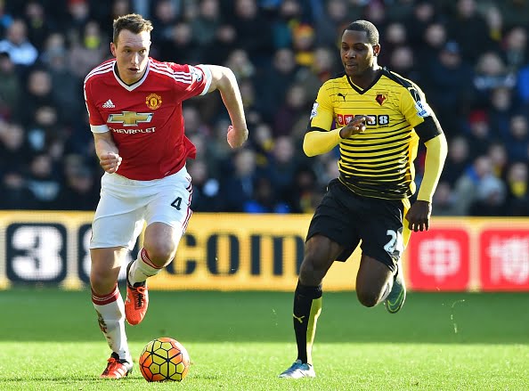 Manchester United's English defender Phil Jones (L) vies with Watford's Nigerian striker Odion Ighalo during the English Premier League football match between Watford and Manchester United at Vicarage Road Stadium in Watford, north of London on November 21, 2015. AFP PHOTO / BEN STANSALL
