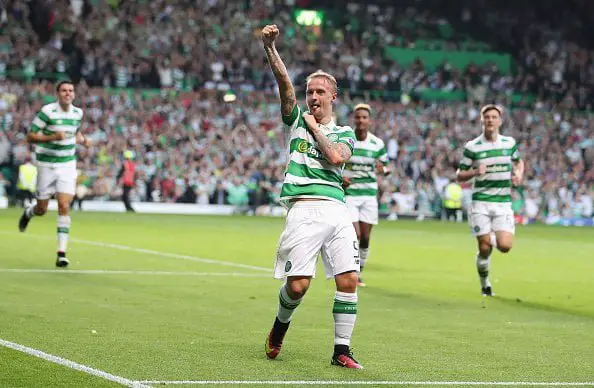 GLASGOW, SCOTLAND - AUGUST 17:  Leigh Griffiths of Celtic celebrates scoring his team's third goal during the UEFA Champions League Play-off First leg match between Celtic and Hapoel Beer-Sheva at Celtic Park on August 17, 2016 in Glasgow, Scotland.  (Photo by Steve Welsh/Getty Images)