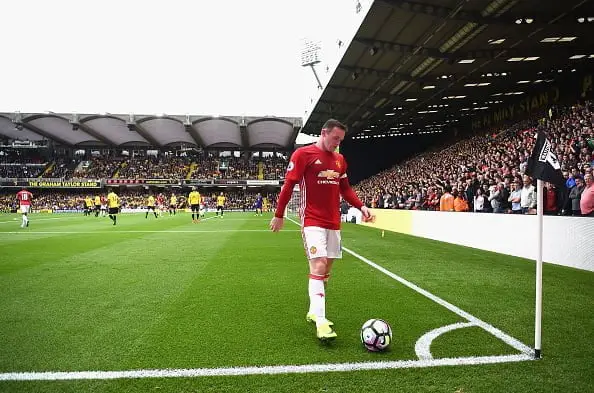 WATFORD, ENGLAND - SEPTEMBER 18:  Wayne Rooney of Manchester United prepares to tae a corner kick during the Premier League match between Watford and Manchester United at Vicarage Road on September 18, 2016 in Watford, England.  (Photo by Laurence Griffiths/Getty Images)