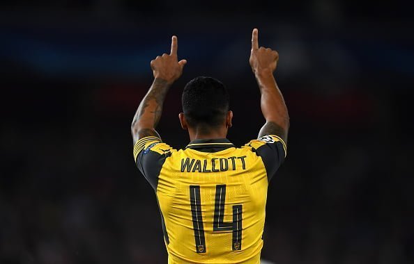 LONDON, ENGLAND - SEPTEMBER 28:  Theo Walcott of Arsenal ceclebrates after scoring the opening goal during the UEFA Champions League group A match between Arsenal FC and FC Basel 1893 at the Emirates Stadium on September 28, 2016 in London, England.  (Photo by Mike Hewitt/Getty Images)