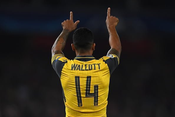 LONDON, ENGLAND - SEPTEMBER 28:  Theo Walcott of Arsenal celebrates his second goal during the UEFA Champions League Group A match between Arsenal FC and FC Basel 1893 at Emirates Stadium on September 28, 2016 in London, England.  (Photo by Mike Hewitt/Getty Images)