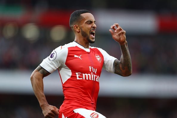 LONDON, ENGLAND - SEPTEMBER 24:  Theo Walcott of Arsenal celebrates scoring his sides second goal during the Premier League match between Arsenal and Chelsea at the Emirates Stadium on September 24, 2016 in London, England.  (Photo by Paul Gilham/Getty Images)
