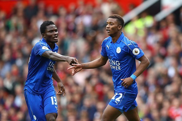 MANCHESTER, ENGLAND - SEPTEMBER 24:  Demarai Gray of Leicester City (R) celebrates scoring his sides first goal with Daniel Amartey of Leicester City (L)during the Premier League match between Manchester United and Leicester City at Old Trafford on September 24, 2016 in Manchester, England.  (Photo by Clive Brunskill/Getty Images)