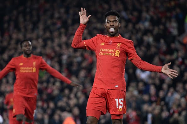 Liverpool's English striker Daniel Sturridge (R) celebrates after scoring their second goal during the EFL (English Football League) Cup fourth round match between Liverpool and Tottenham Hotspur at Anfield in Liverpool north west England on October 25, 2016. / AFP / Oli SCARFF / RESTRICTED TO EDITORIAL USE. No use with unauthorized audio, video, data, fixture lists, club/league logos or 'live' services. Online in-match use limited to 75 images, no video emulation. No use in betting, games or single club/league/player publications.  /         (Photo credit should read OLI SCARFF/AFP/Getty Images)
