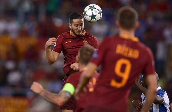 Roma's Greek defender Kostas Manolas (L) heads the ball during the UEFA Champions League second leg play off football match between AS Roma and FC Porto on August 23, 2016 the Olympic Stadium in Rome. / AFP / FILIPPO MONTEFORTE        (Photo credit should read FILIPPO MONTEFORTE/AFP/Getty Images)