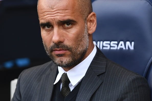 Manchester City's Spanish manager Pep Guardiola waits for kick off of the English Premier League football match between Manchester City and Bournemouth at the Etihad Stadium in Manchester, north west England, on September 17, 2016. / AFP / PAUL ELLIS / RESTRICTED TO EDITORIAL USE. No use with unauthorized audio, video, data, fixture lists, club/league logos or 'live' services. Online in-match use limited to 75 images, no video emulation. No use in betting, games or single club/league/player publications.  /         (Photo credit should read PAUL ELLIS/AFP/Getty Images)