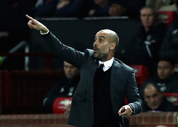 MANCHESTER, ENGLAND - OCTOBER 26:  Josep Guardiola, Manager of Manchester City gives his team instructions during the EFL Cup Fourth Round match between Manchester United and Manchester City at Old Trafford on October 26, 2016 in Manchester, England.  (Photo by David Rogers/Getty Images)