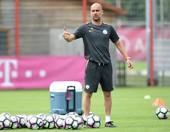 Manchester's new Spanish headcoach Pep Guardiola attends a training session of Manchester City at the training ground of the German first division football team FC Bayern Munich in Munich, southern Germany, on July 21, 2016.  / AFP / CHRISTOF STACHE        (Photo credit should read CHRISTOF STACHE/AFP/Getty Images)