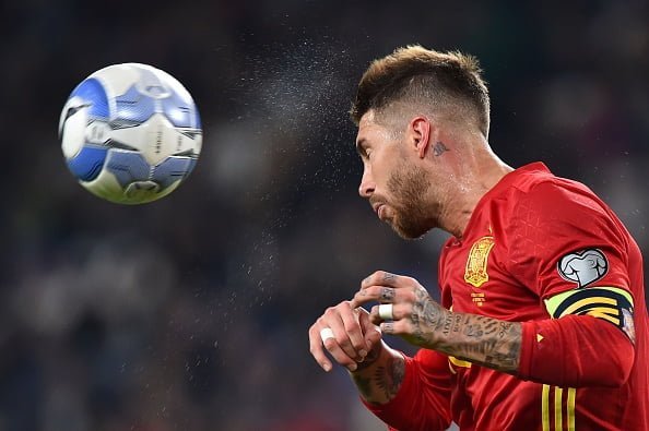 Spain's defender Sergio Ramos heads off the ball during the WC 2018 football qualification match between Italy and Spain on October 6, 2016 at the Juventus stadium in Turin / AFP / GIUSEPPE CACACE        (Photo credit should read GIUSEPPE CACACE/AFP/Getty Images)